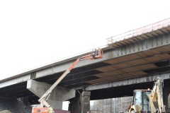 November 2022 - Removing overhangs from the completed northbound bridge over the railroad and Old Lincoln Highway.